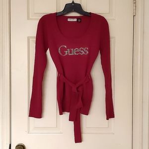 NWOT. Guess Woman's Scoop neck sweater with crystal embroidered logo and belt.